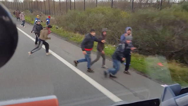 Frustrated trucker swerves his lorry at migrants near Calais